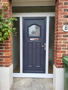 Midnight blue composite door with brass letterbox