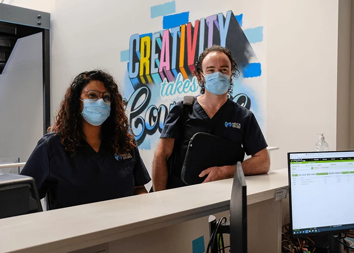 MDCA dental staff at a corporate workplace reception