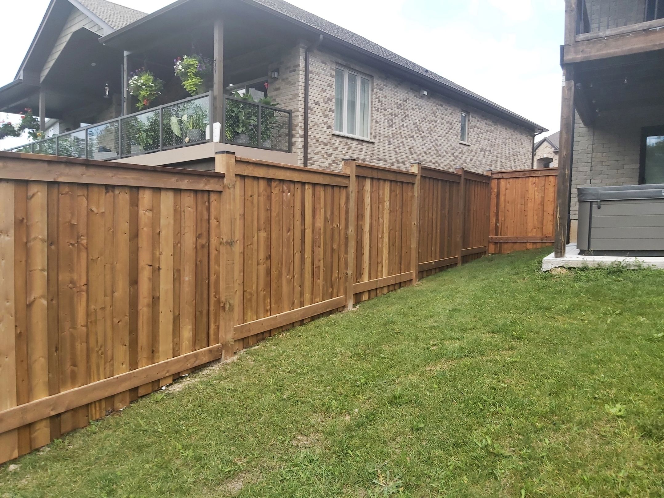 Professionally installed wood fence in a London Ontario residential neighbourhood