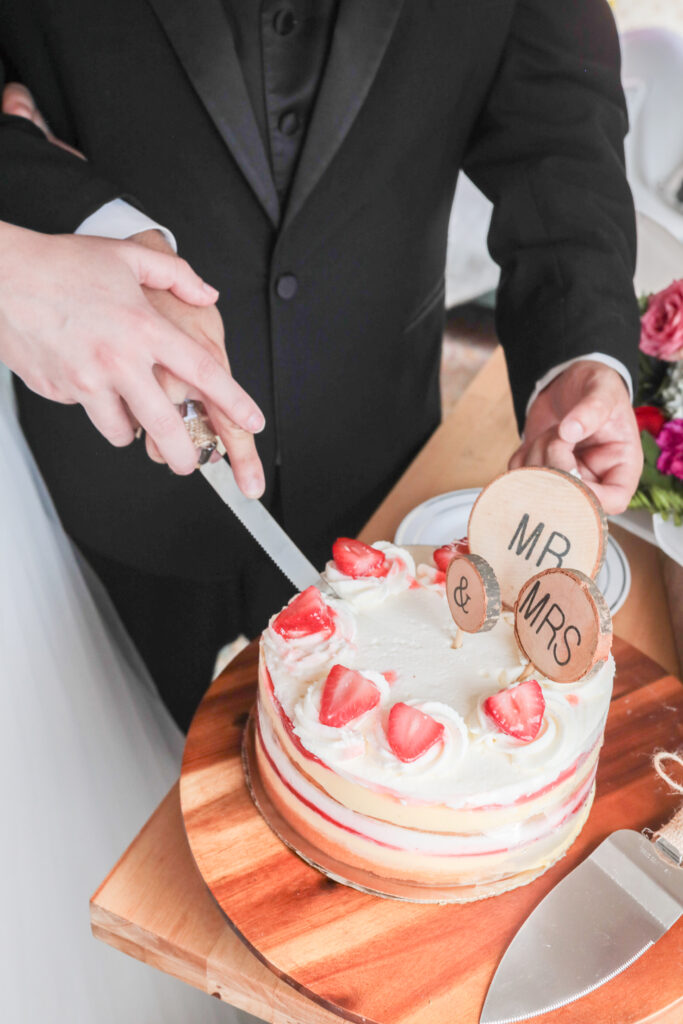 Couple celebrating their wedding with champagne