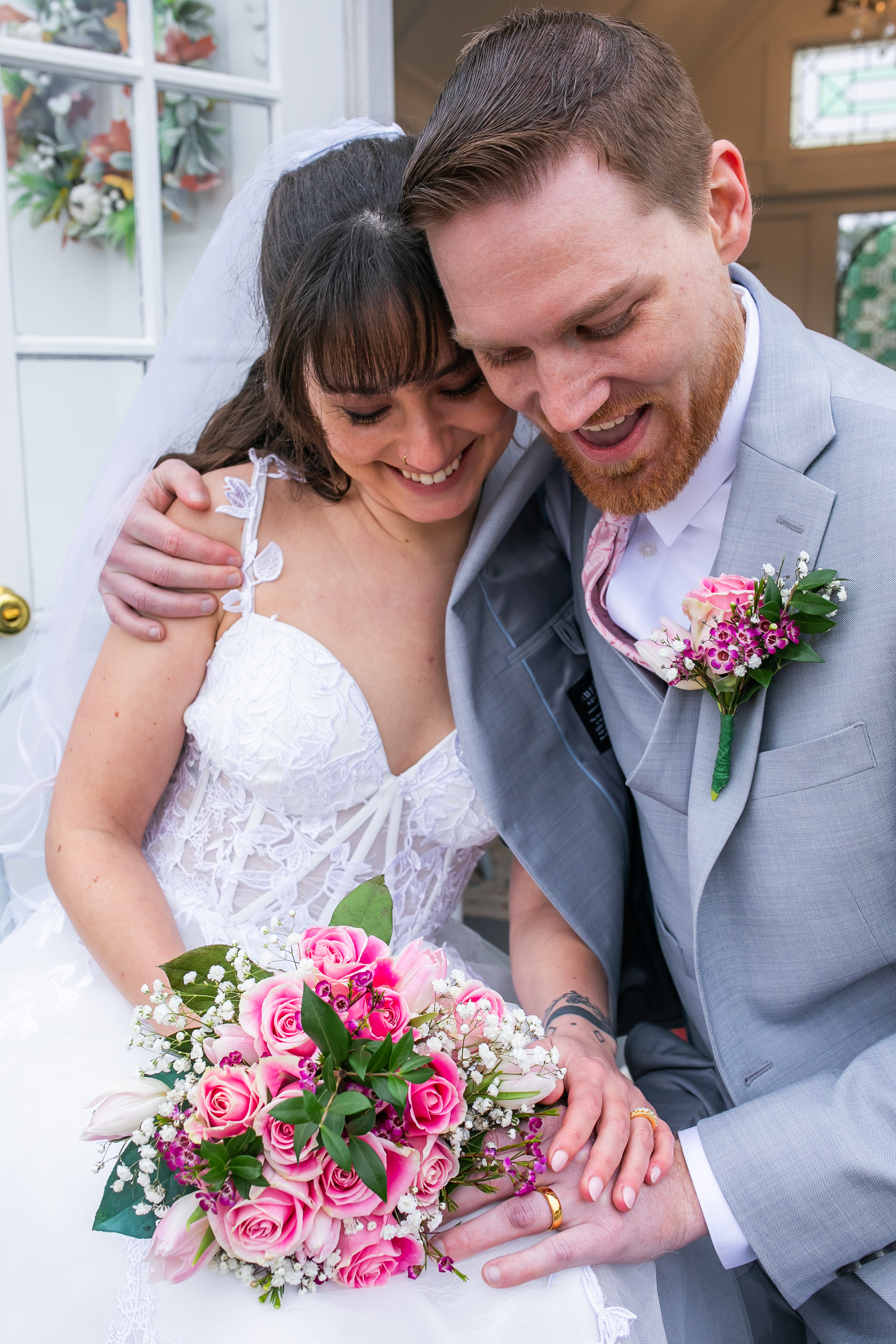 Happy couple with their dog at a pet-friendly elopement at Chapel of Love ATX