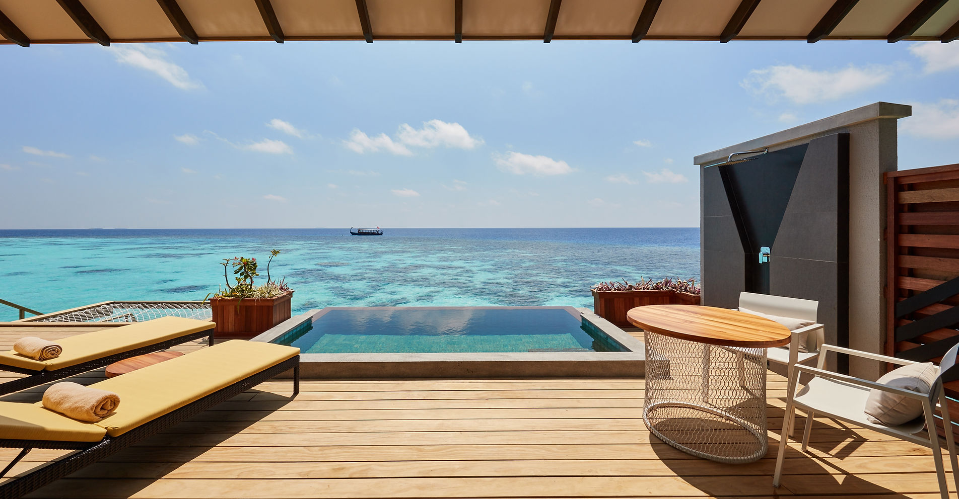 Oceanfront deck with private plunge pool at Amari Havodda Maldives