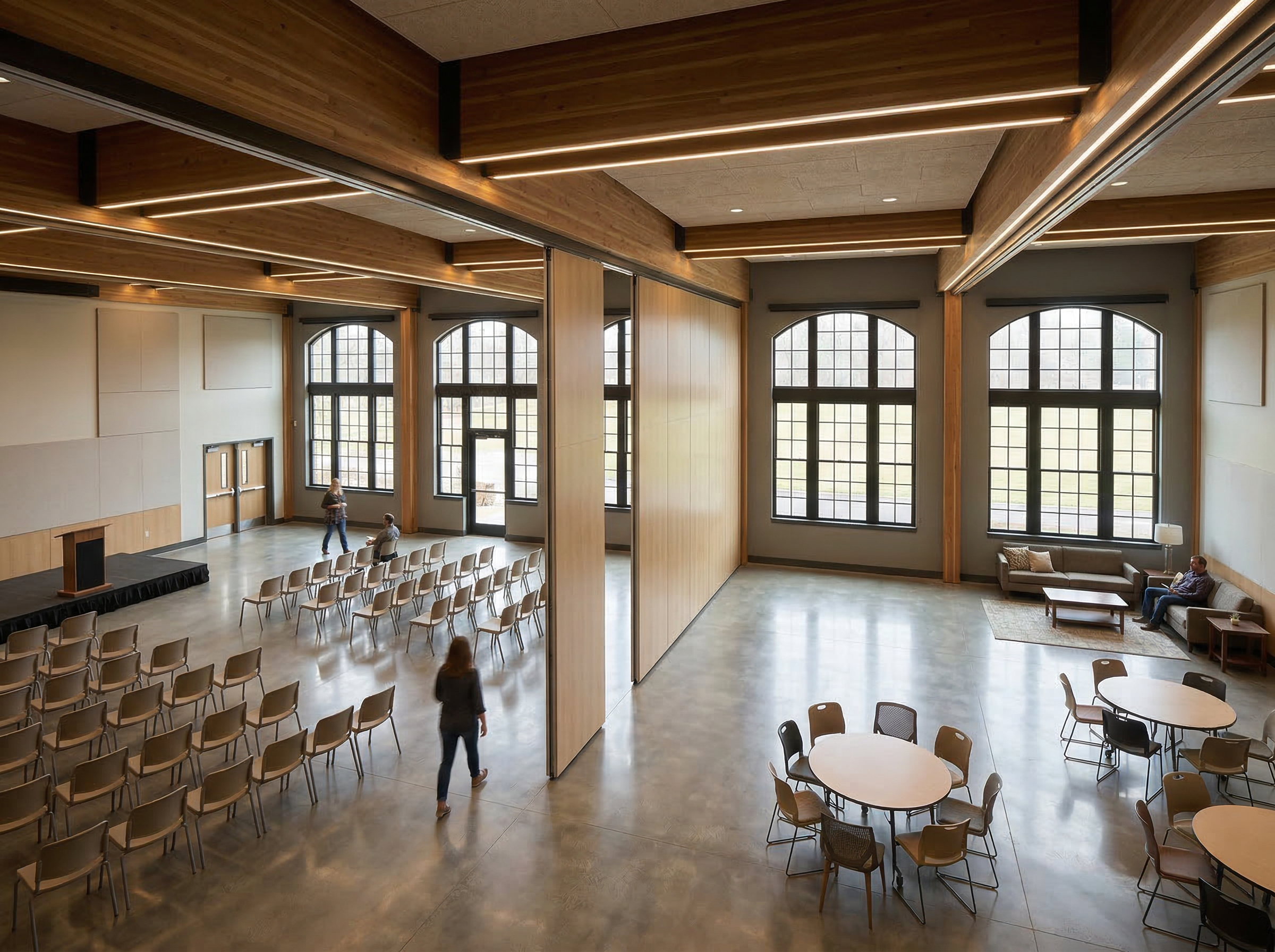 Large community hall divided by movable acoustic partition wall