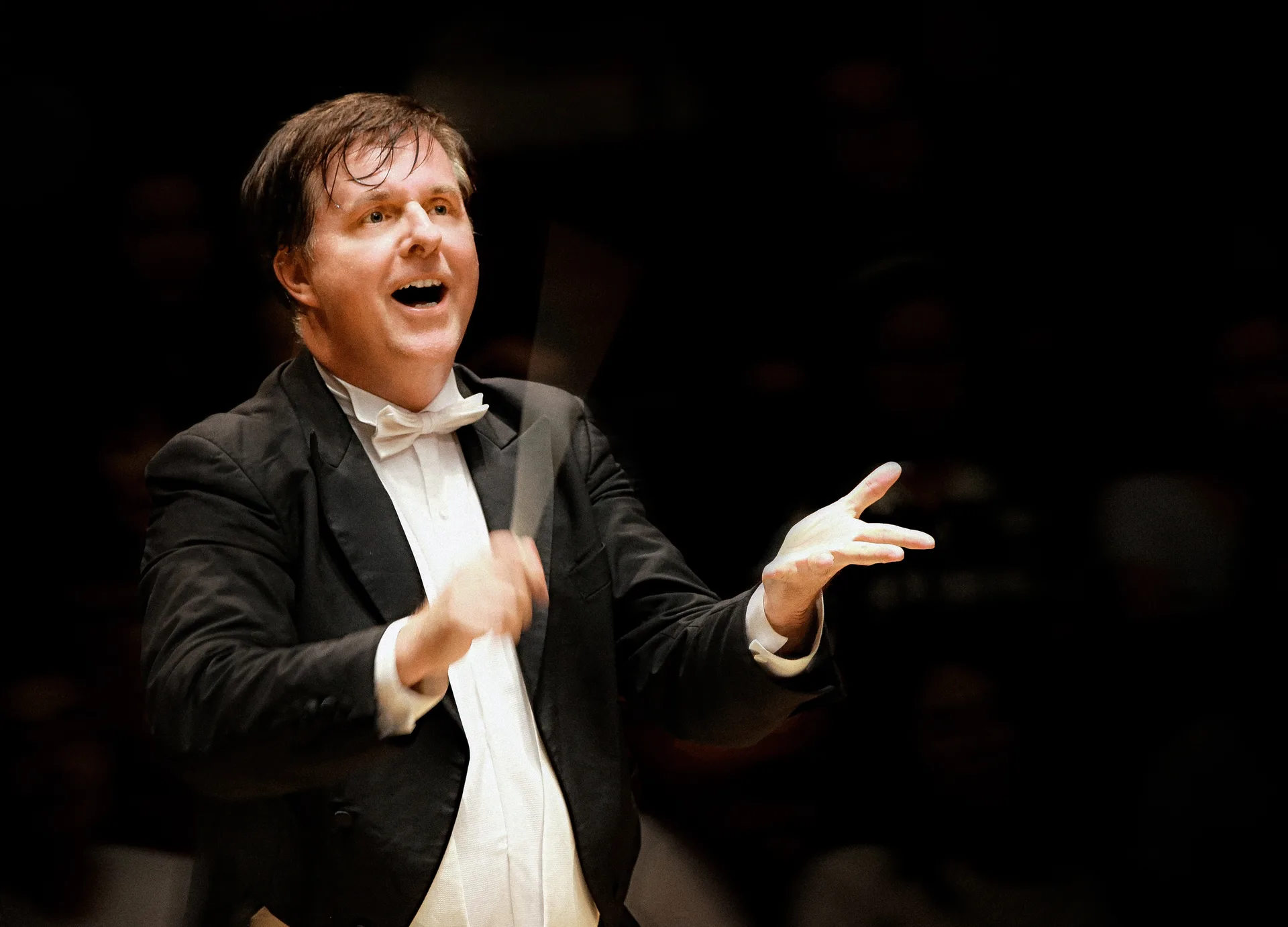 Maestro Michael Koehler conducting