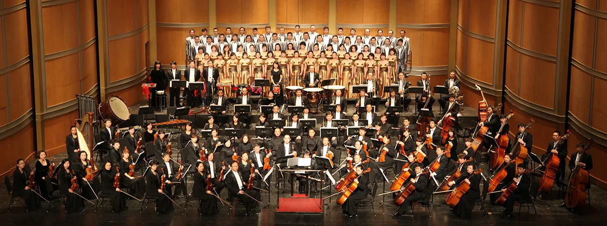 Shanxi Symphony Orchestra full ensemble on stage