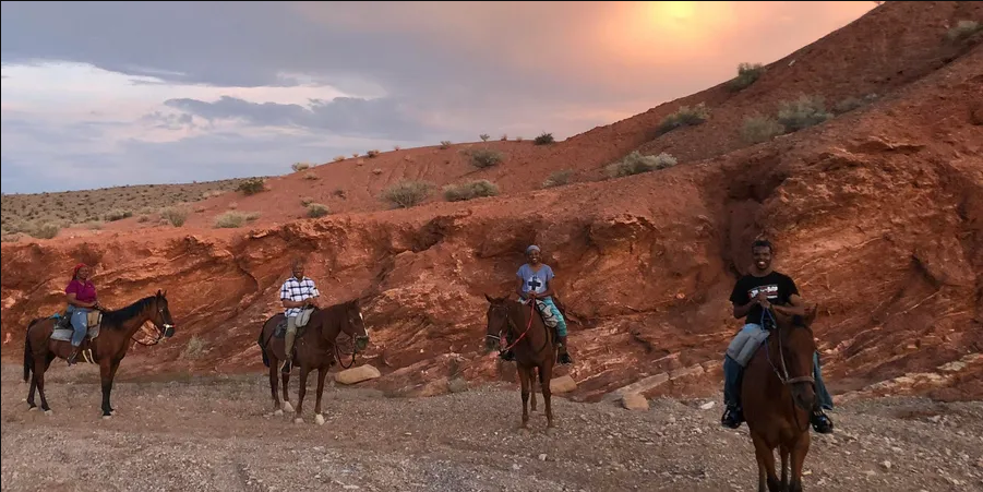 Sunset horseback riding tour near Las Vegas at dusk