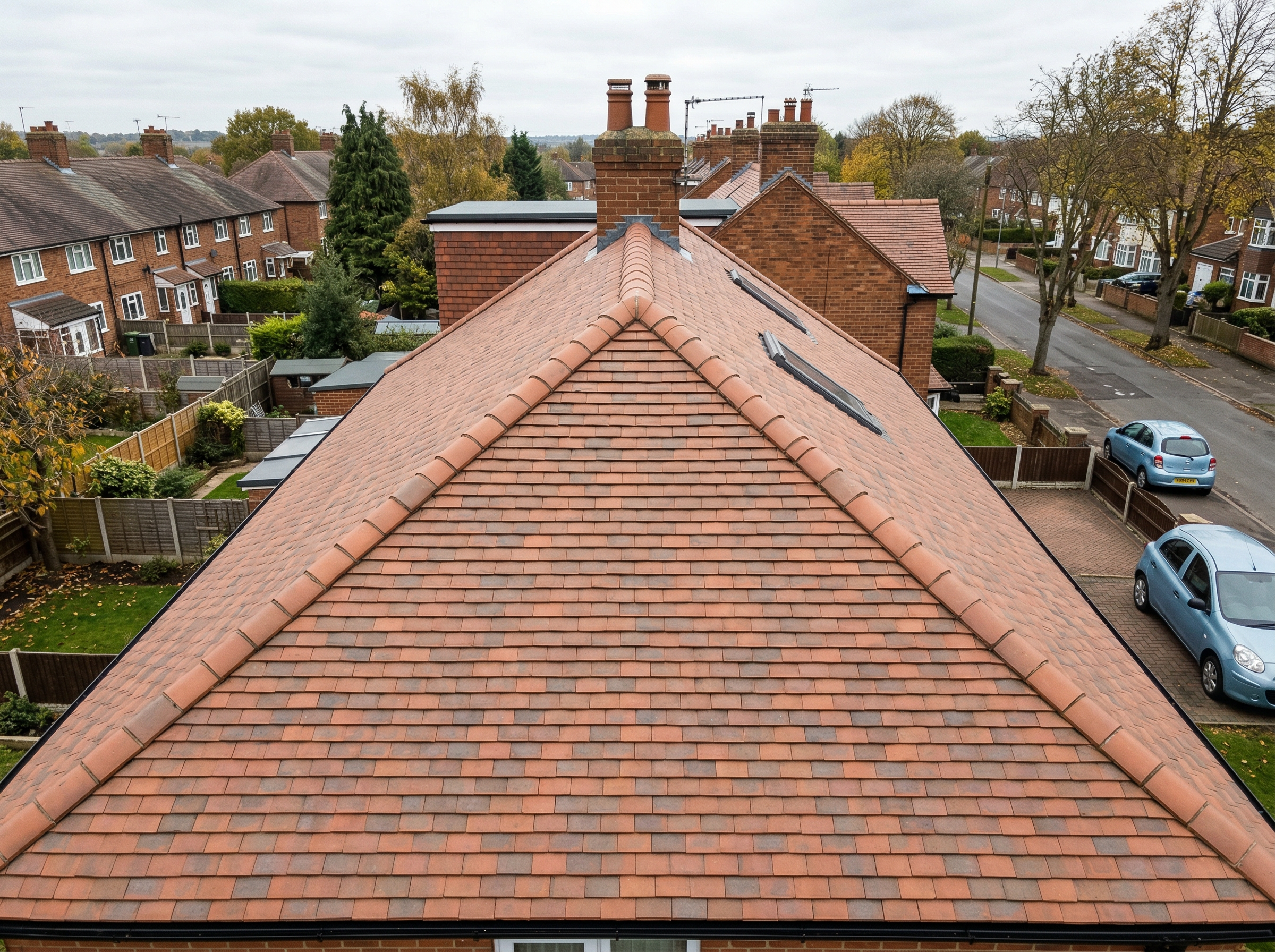 Clean clay roof tiles after professional soft-wash treatment